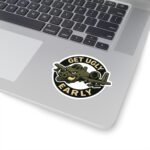 A-10 Get Ugly Early sticker on the corner of a silver laptop