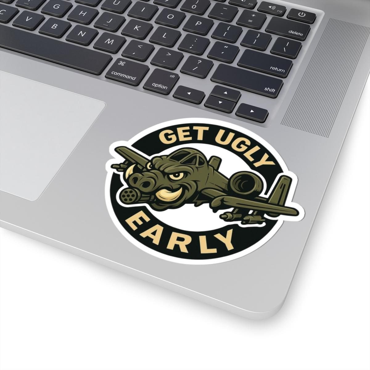 Large A-10 Get Ugly Early sticker on a laptop below the keyboard