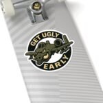 A-10 Get Ugly Early sticker on the grip-tape side of a skateboard deck