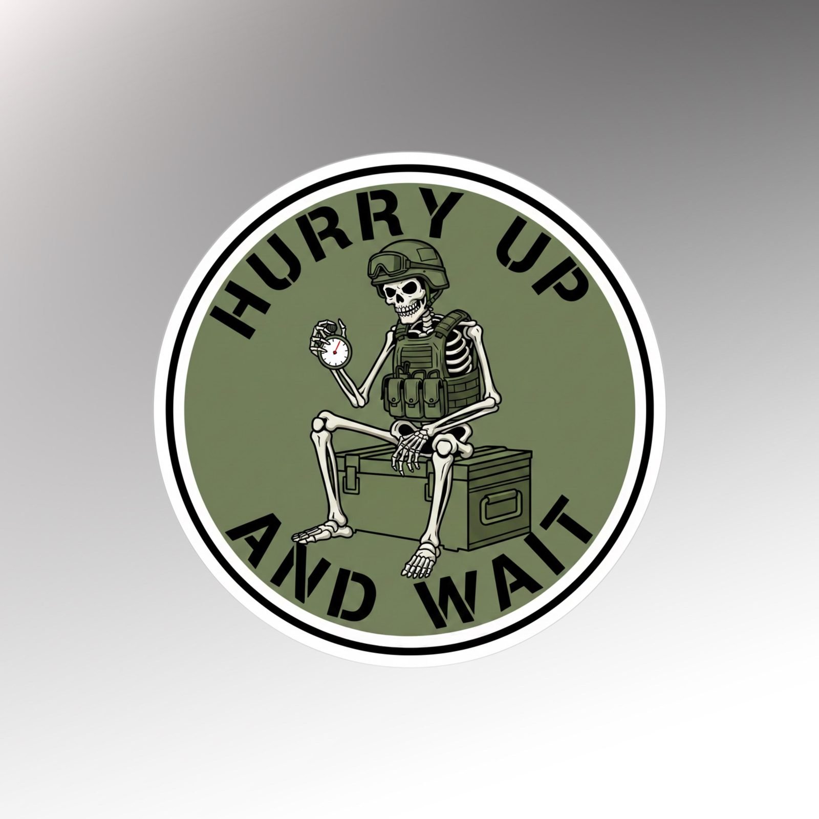 Round olive sticker reading Hurry Up and Wait with a skeleton in a helmet and vest sitting on a crate