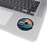Silent Service submarine sticker on a silver laptop below the keyboard