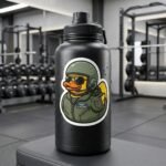 Air Force duck sticker on a black water bottle in a gym with weights behind it